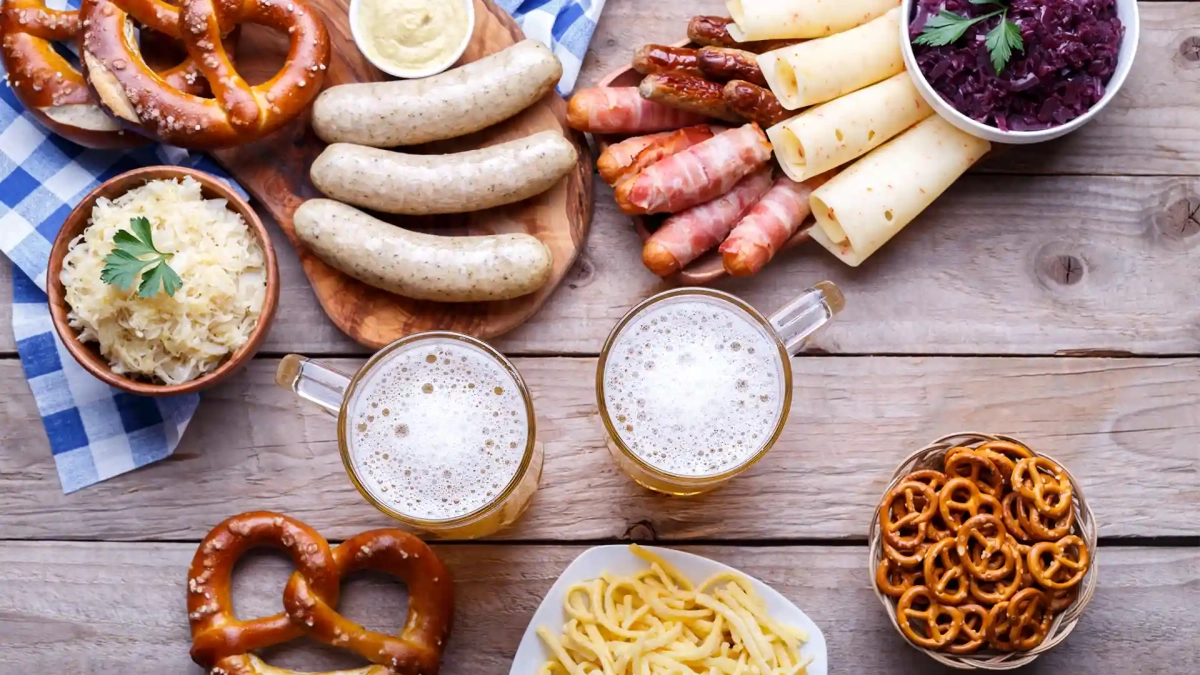 Traditional German food including roasted chicken and pretzels
